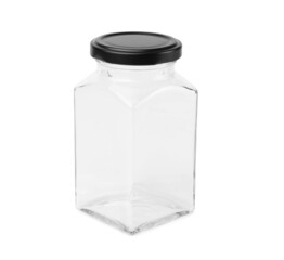 Empty glass jar with black lid isolated on a white background