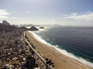 Copacabana beach, Rio de Janeiro, Brazil. Beautiful seaside town with old white buildings. Drone...