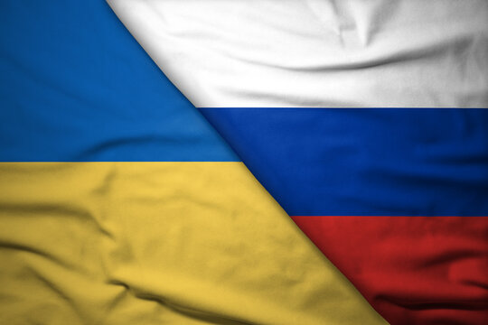 Ukrainian and Russian flags background