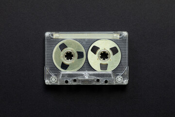 Vintage audio cassette on black background