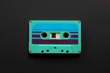 Vintage audio cassette on black background