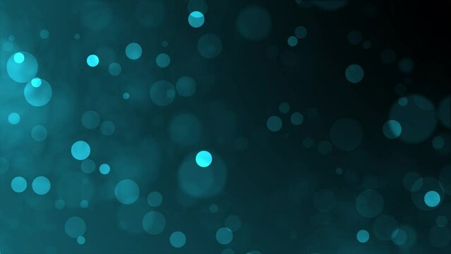 Animated fading light blue particles background.