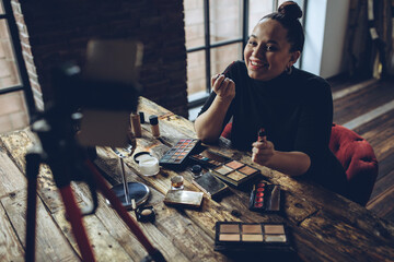 A woman does makeup live. High quality photo - obrazy, fototapety, plakaty