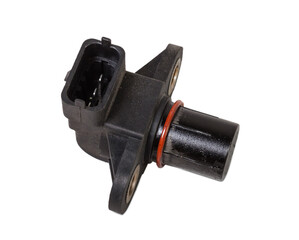 Electromagnetic crankshaft position sensor of a car engine in the hands of an auto mechanic. Spare...