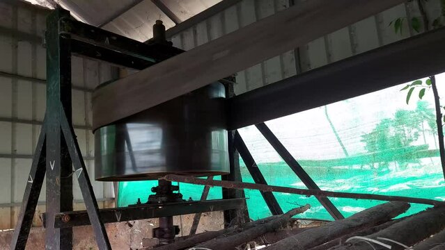 The 'Petti Para' system used for irrigation in paddy fields of Kerala ,a huge motor attached to a wooden box
