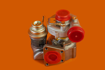 Brand new turbo charger or automotive turbine, vintage type or style, smaller turbo, isolated on...