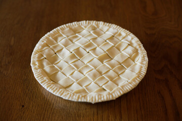 Homemade apple pie on a wooden table. Making apple pie.
