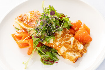 omelet with fresh vegetables and salmon