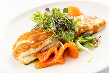 omelet with fresh vegetables and salmon