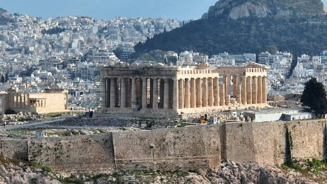 flying around Acropolis in Greece, Parthenon in Athens aerial view, famous Greek tourist attraction, Ancient Greece landmark