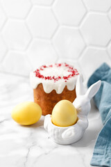 Traditional easter cake or sweet bread with white meringues top glaze. Side view. Easter treat, holiday symbol