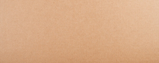 Beige recycled craft paper texture as a background. Brown paper texture, old paper grunge background, vintage page or grunge vignette wrapping. Empty background.