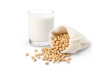 Glass of soy milk and soybean in sack bag isolated on white background.