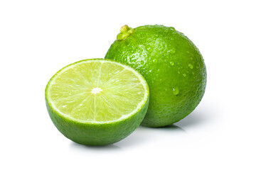 Fresh lime with water drops and cut in half sliced isolated on white background.