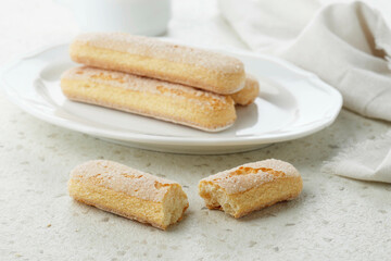 Fototapeta na wymiar Italian Cookie Savoiardi. Ladyfinger Sweet Biscuits. Sponge Cookies Tiramisu