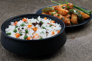 Chinese dishes combo of shezwan Chilli Potato wedges , manchurian, with fried rice