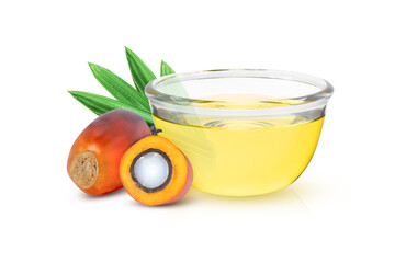 Palm oil in glass bowl and fresh palm fruit with green leaf solated on white background.