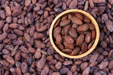 Cocoa beans pattern texture background. Yop view. Flat lay.