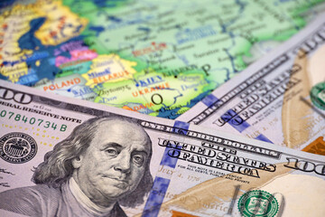 US dollars on map of Ukraine. Concept of american support for Kiev during special military operation of Russia