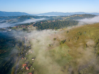 Morning fog in the Ukrainian Carpathians. Aerial drone view.