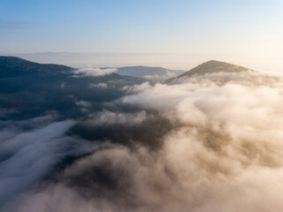 Morning fog in the Ukrainian Carpathians. Aerial drone view.