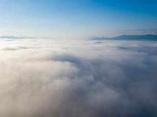 Morning fog in the Ukrainian Carpathians. Aerial drone view.