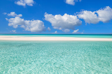 Sea sand sky on a summer day. Tranquil nature scene, closeup amazing blue sea with horizon and blue sky. Idyllic tropical island shore, coast landscape. Beautiful exotic beach, travel vacation concept