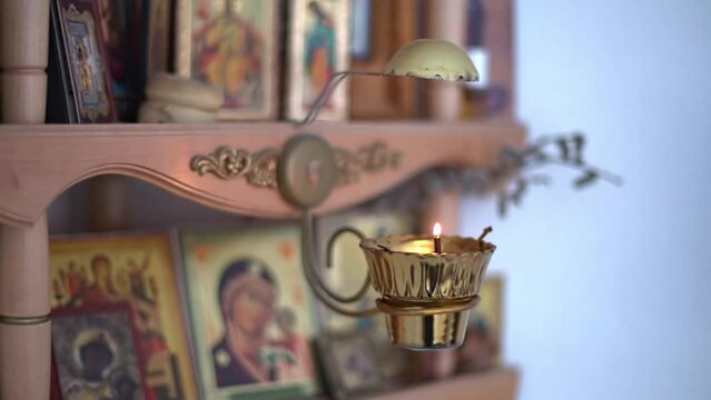 orthodox icons with a lamp on the wall in a Russian house.
