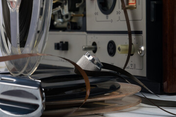 old magnetic cassettes on the background of the player