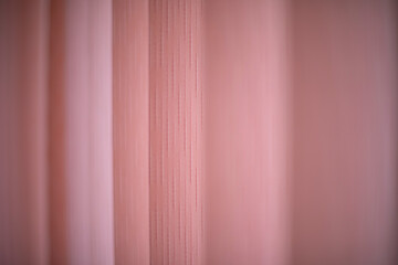 Texture pink blinds. Blinds on window. Protection from light.