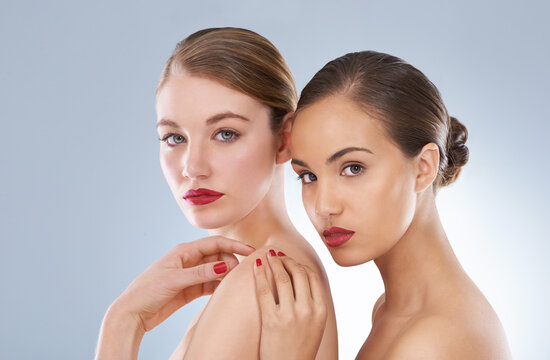 Beautiful...naturally. Studio beauty shot of a two young models.