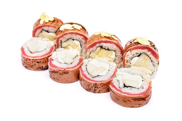 Sushi set with tuna, pear and Philadelphia cheese. Sushi decorated with almond flakes