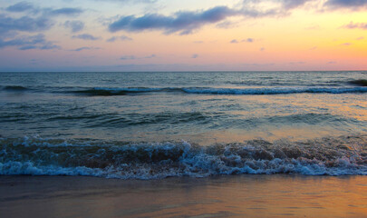 Bright beautiful sunset at the calm sea.
