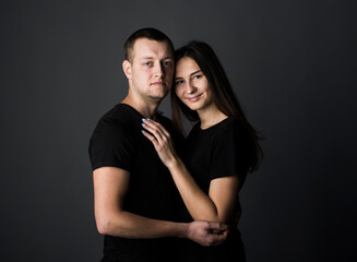 
close-up portrait of a pair of beautiful young guys and girls with a range of emotions and views on a dark background