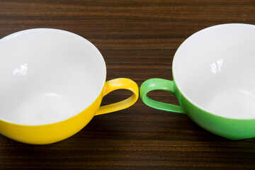 yellow and green tea cups 