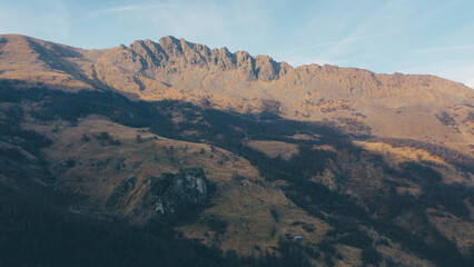 Fototapeta na wymiar Aerial view of mountain peaks in the Italian Alps.