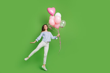 Full size photo of charming good mood lady celebrate her birthday party occasion isolated on green color background