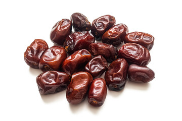 Dried dates with wrinkled skin on a white background