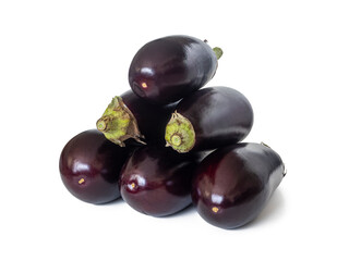 Several purple eggplants stacked on top of each other