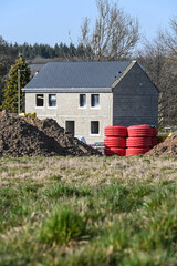 batiment architecture construction maison immobilier logement materiaux beton nouveau quartier Belgique Habay