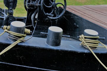 black mooring bollards on a sailship