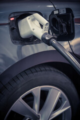 Charging plug for an electric car