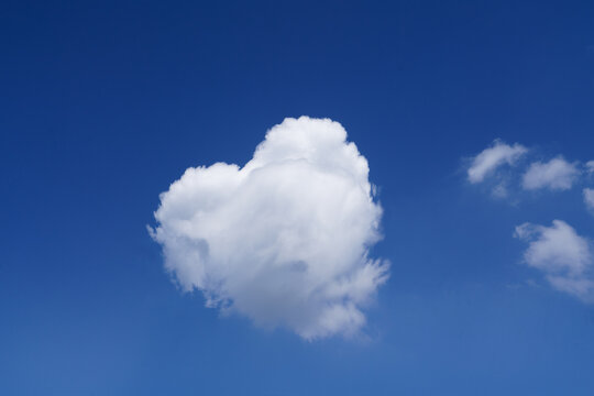 Heartshaped white clear cloud with blue sky 