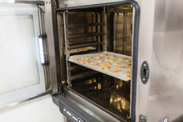 Freshly baked cookies inside the bakery oven
