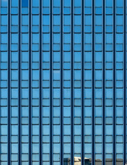 Reflections on windows of glass building