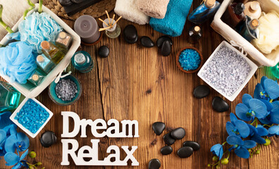 Spa accessories on wooden paneling. Spa treatments.