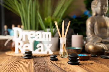 Spa accessories on wooden paneling. Spa treatments.