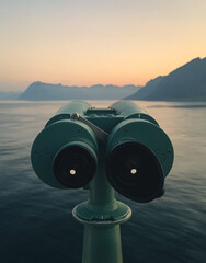 Binoculars pointing to an Island