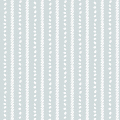 Seamless repeating pattern with hand drawn scribble, wavy lines on light background for craft, apparel, surface design and other design projects