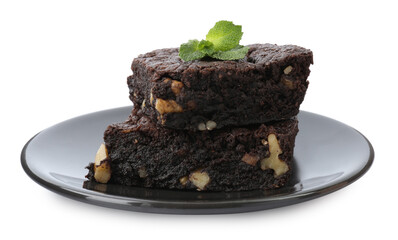 Delicious brownies with nuts and mint on white background